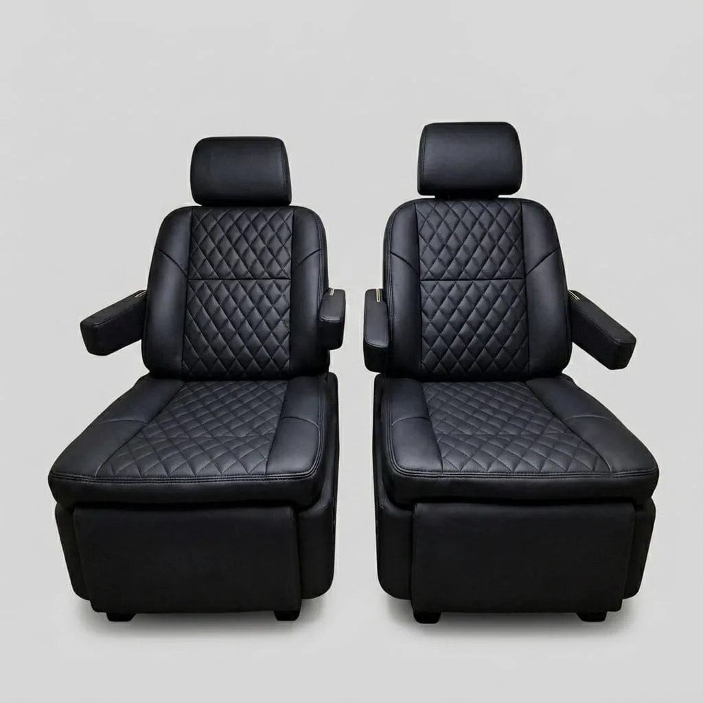 Premium black quilted leather captain's chairs reclined with footrests extended, showing electric reclining and footrest adjustment