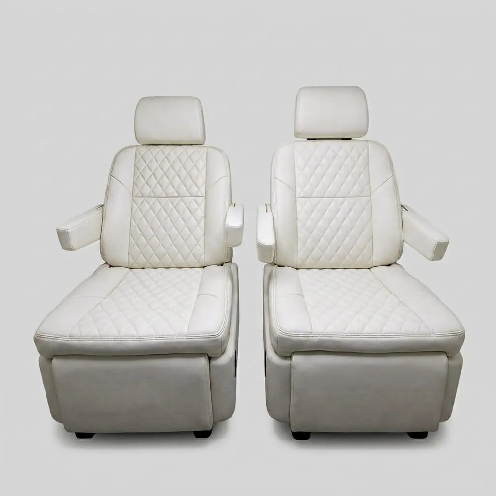 Premium business-inspired fully adjustable comfort seating in cream — two quilted ivory leather captain's chairs with diamond stitching, integrated headrests, and padded armrests